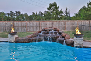 waterfall, fire bowls, freeform pool, houston pool builder, chattanooga pool builder