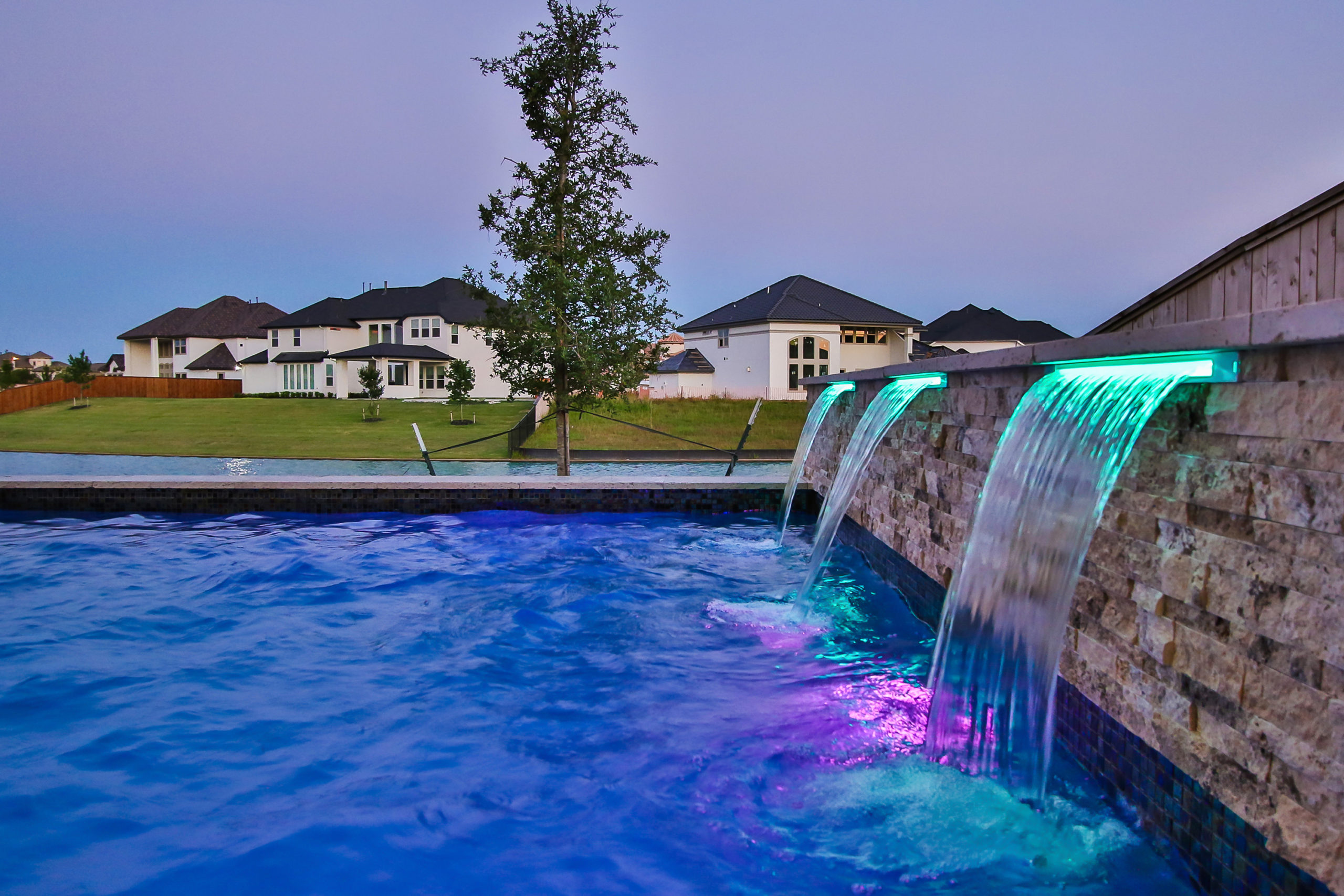 Sheer Waterfalls on Geometric Pool Design